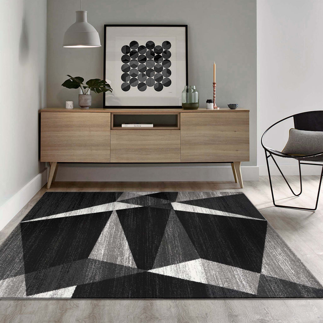 Grey rug styled in an open-plan living room — Rug Queen Australia