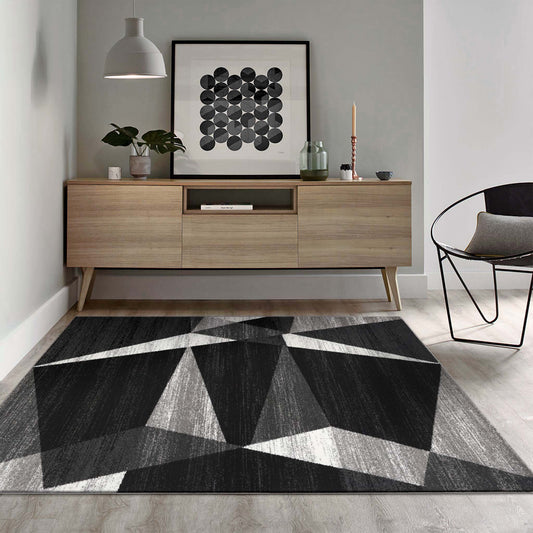 Grey rug styled in an open-plan living room — Rug Queen Australia