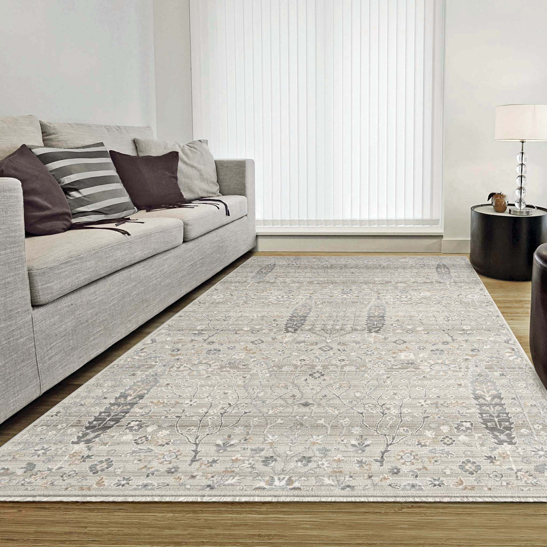 Grey rug on timber flooring in an Australian living room — Rug Queen Australia